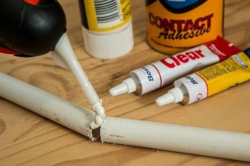 glue adhesive to repair pipe