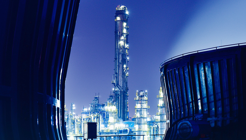 Power generation facility lit up at night